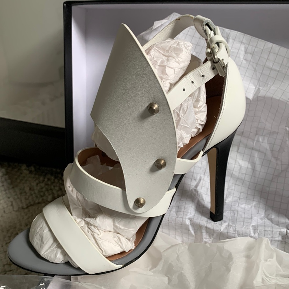 High heel, eye catching shoes. Upscale name brand.